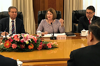FTC and Chinese Anti-Monopoly Agencies officials in a meeting